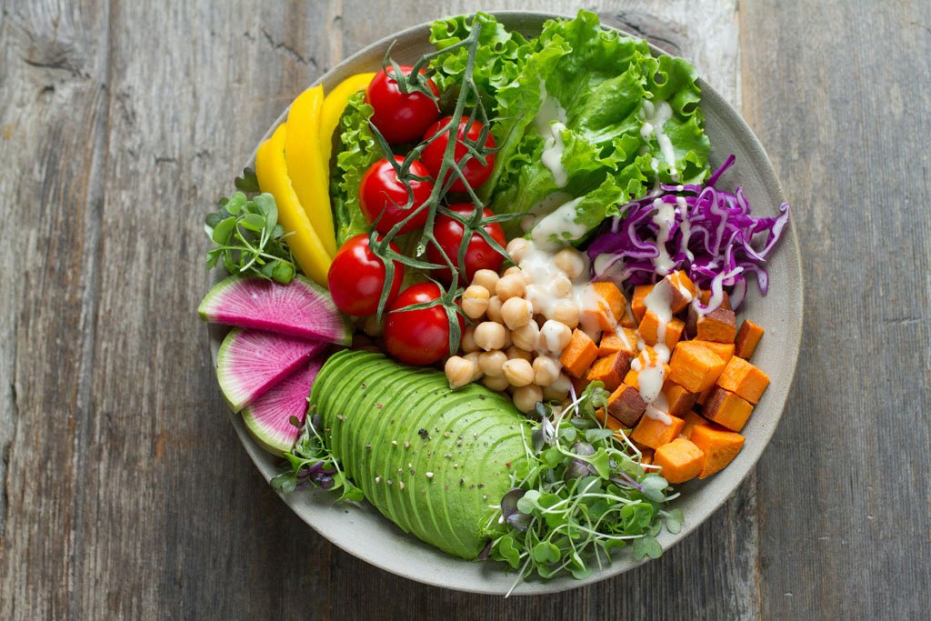 garden harvest salad with fresh seasonal vegetables and herbs